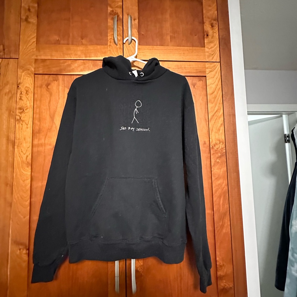 Stylish Black Hoodie with Minimalist Graphic